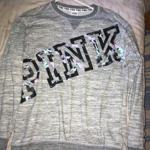 Pink (brand) sweater.